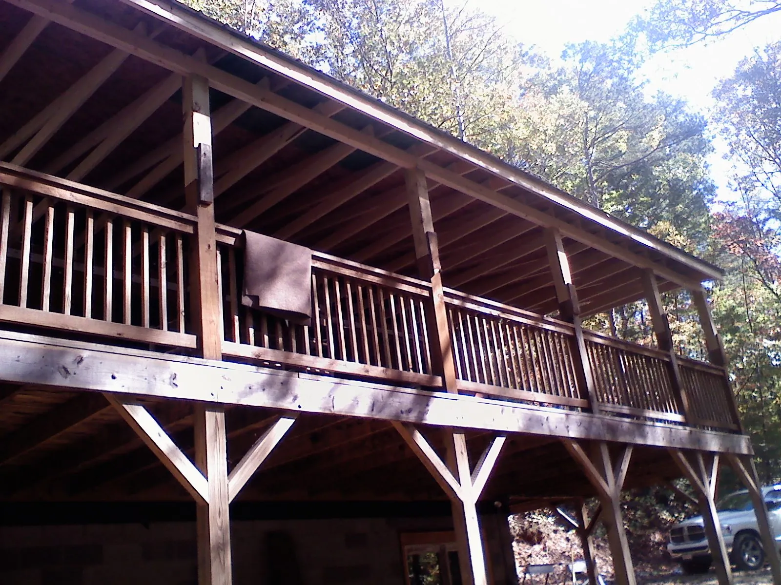 Timber framing under a new elevated porch and deck — Roof Leak Repair in Mather by Roofing Brothers